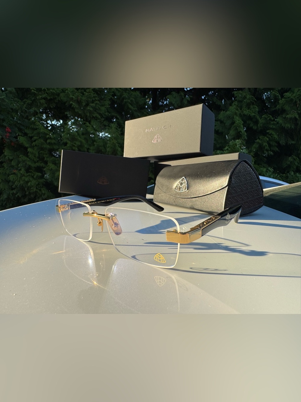 Men’s Rimless Gold and Black Sunglasses